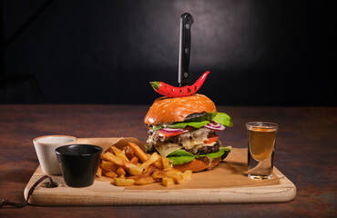 Fresh, delicious burgers with a beef patty, lettuce, onions, tomatoes and cucumbers. A large, fresh...