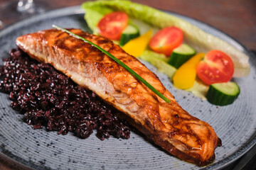 Grilled salmon, rice and vegetables