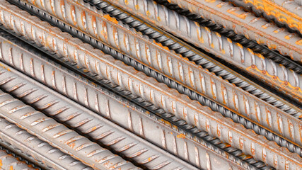 Steel reinforcement for concrete reinforcement. Pile of steel rebars stacked on a construction site