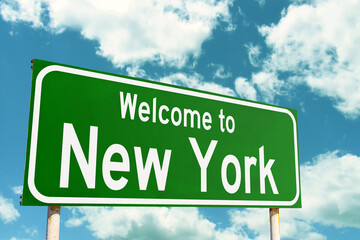 Welcome To New York Green Road Sign at the entrance to the state.