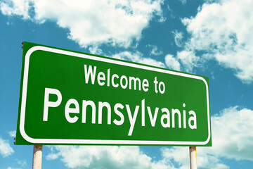 Welcome To Pennsylvania Green Road Sign at the entrance to the state.