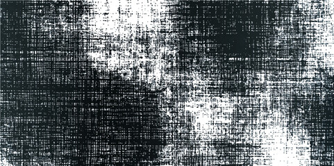 A black and white photo showcasing a textured surface.Textured gray fabric background