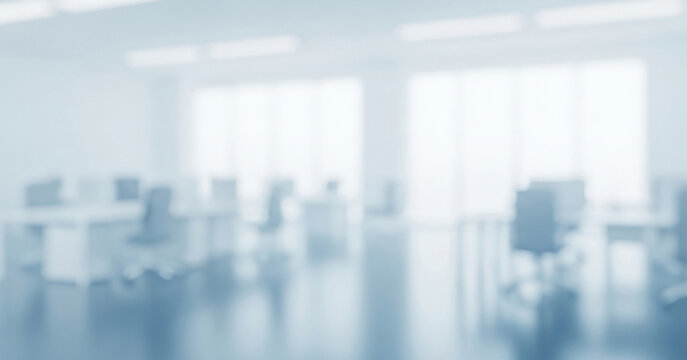 Blurred office interior with desks chairs and large windows light and airy., frequently applied in minimalist web layouts, software dashboards, or business campaigns