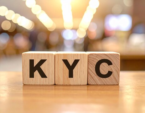 KYC word on wooden blocks letter KYC Compliance: Know Your Customer for Secure Transactions