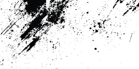 Abstract ink splatter background with black and white textures. A dynamic and chaotic effect, movement with different sizes of spots, splashes, drips, drops and smudges. Isolated on white background. 