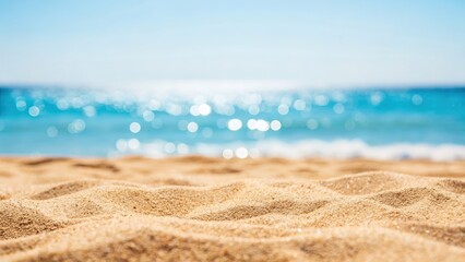 Serene beach scene with shimmering water and soft sand in the foreground.