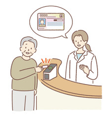 病院でマイナンバーカードを読取り機にかざす高齢者（おじいさん） 