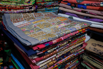 colorful textiles for sale in the textile shop Jaisalmer, India