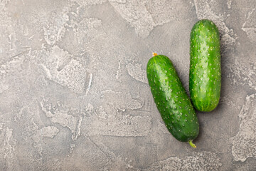 Cucumber on wooden background. Slice of cucumber on background. Fresh organic green cucumbers...