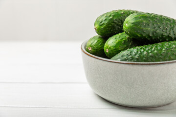 Cucumber on wooden background. Slice of cucumber on background. Fresh organic green cucumbers...