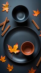 Autumn table setting with leaves cinnamon sticks and bowls for thanksgiving dinner decor