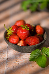 Cup filled with fresh strawberries. Seasonal summer berries, healthy dessert or snack.