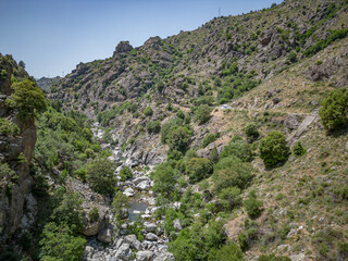Camping Caravan driving through Canyon de la Ruda road Corsica down the pass monte Cino