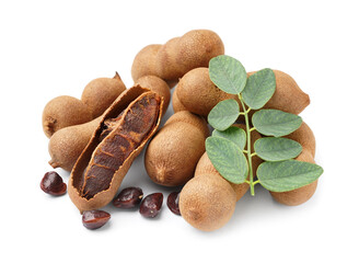 Heap of tasty tamarinds, seeds and leaf on white background