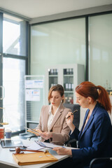  business team and lawyers discussing contract papers sitting at the table. Concepts of law, advice, legal services.