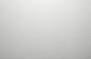 Close-up of textured grey paperboard with horizontal ribbed stripes. Natural craft material features a subtle grain and clean lines, ideal for packaging, backgrounds, or design projects.