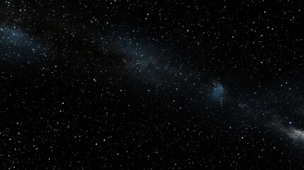 A starry night sky with a galaxy in the background.
