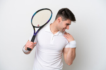 young tennis player man isolated on white background suffering from pain in shoulder for having...