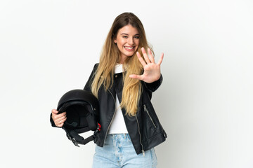 Fototapeta premium Woman holding a motorcycle helmet isolated on white background counting five with fingers