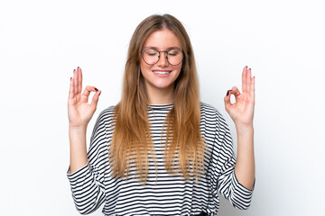 Young caucasian woman isolated on white background in zen pose