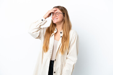 Young blonde woman isolated on white background smiling a lot