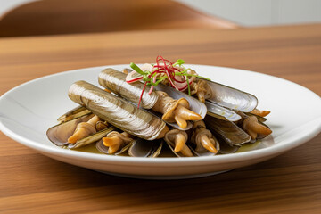 Razor Clams: These elongated, bivalve mollusks are known for their sweet, delicate flavor and tender texture.