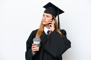 Young university graduate caucasian woman isolated on white background holding coffee to take away...