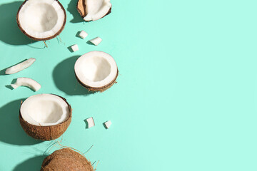 Fresh coconuts on turquoise background