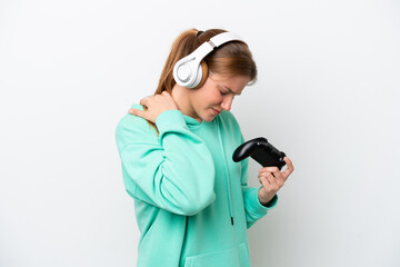 Young caucasian woman playing with a video game controller isolated on white background suffering...