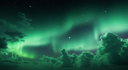 Green aurora borealis over clouds
