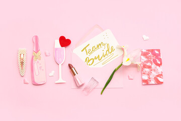 Card with text TEAM BRIDE and decor on pink background. Hen Party