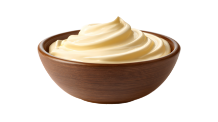 A creamy, light-yellow swirl filling a rustic, textured brown bowl casting shadow on white backdrop