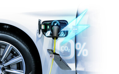 Power cable pump plug in charging power to electric vehicle EV car.