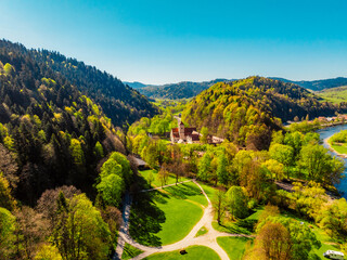 Medieval monastery Cerveny Klastor near Peak Tri Koruny or Trzy Korony in Pieniny National park in Slovakia and Poland © Zedspider