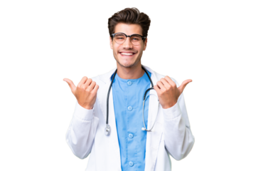 Young doctor man over isolated background with thumbs up gesture and smiling