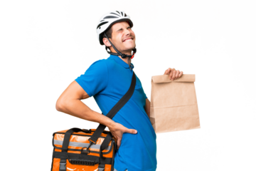 Young caucasian man taking a bag of takeaway food over isolated background suffering from backache for having made an effort