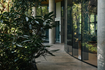 Green buildings with lush trees surround urban offices, blending sustainability and modern technology. Perfect harmony of nature and architecture, promoting eco-friendly and sustainable city living.