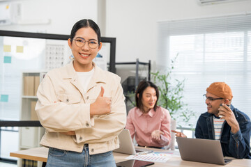Fototapeta premium Asian business start up freelance people team analyzing statistics financial. Group Team of businesspeople man and woman Meeting Conference Discussion various topic Corporate Concept in office.