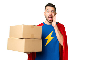 Super Hero delivery caucasian man over isolated chroma key background with surprise and shocked...