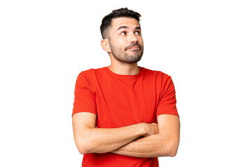 Fototapeta premium Young handsome caucasian man over isolated chroma key background making doubts gesture while lifting the shoulders