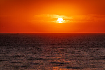Beautiful red and orange sunrise over the sea.