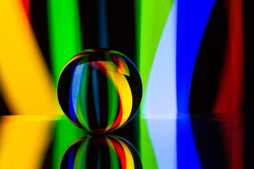 Coloured light and glass lensball