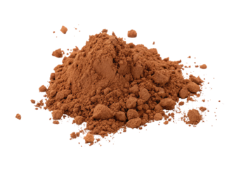 A pile of brown cocoa powder on a black background with small clumps and fine dust particles scattered about