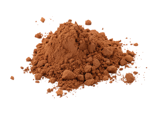 A pile of brown cocoa powder on a black background with small clumps and fine dust particles scattered about