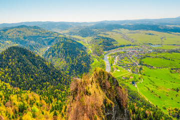 Hiking to peak Tri Koruny or Trzy Korony during day. Pieniny National park in Poland. View from the...