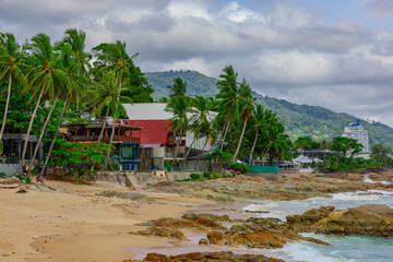 View of Patong Beach in the island of Phuket Thailand, turquoise blue waters of the Andaman and lush green mountains