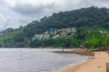 View of Patong Beach in the island of Phuket Thailand, turquoise blue waters of the Andaman and lush green mountains