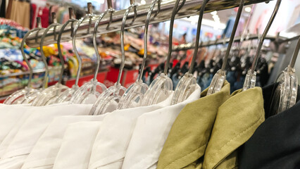 Clothing racks filled with various garments.