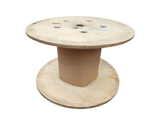 Rustic wooden cable drum used for industrial wire storage captured cleanly for object...