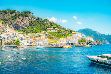 Amalfi  coastline in southern Italy, vertiginous cliffs adorned with colorful villages, turquoise...